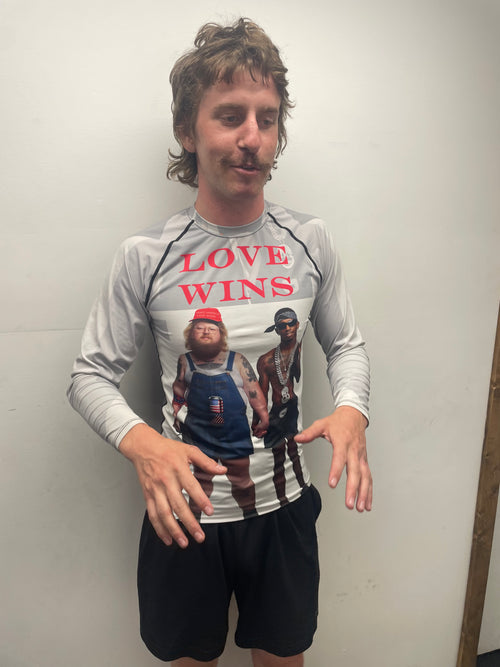 Frosty 10thPlanet wearing rashguard